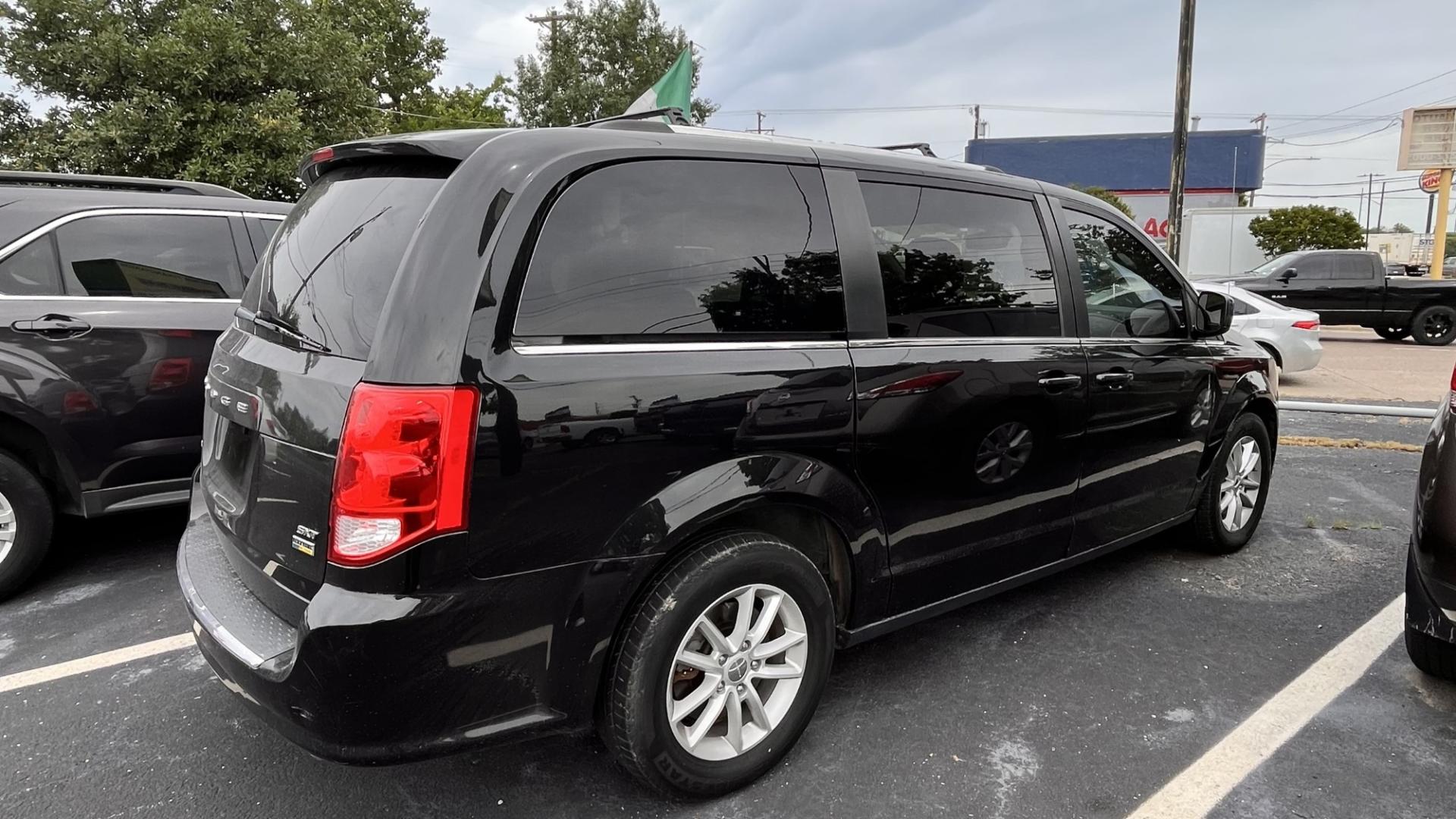 2018 Black Dodge Grand Caravan (2C4RDGCG9JR) , located at 945 E. Jefferson Blvd, Dallas, TX, 75203, (214) 943-7777, 32.752514, -96.811630 - Photo#2